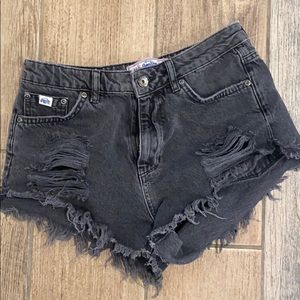black ripped booty shorts